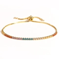 Detail of colorful gradient gemstones on a gold adjustable bracelet with slider clasp - Gold