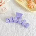 Detailed view of large lavender glitter hair claw clip with wavy geometric structure - Taro Purple
