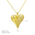 Detail view of heart pendant with polished gold finish and zircon pavé showing dimensions - Asymmetrical Half Stone Heart Style (DN240705-B)