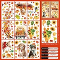 Detail showing 9 sheets of autumn static window clings with maple leaves and pumpkins - Thanksgiving Cats & Dogs