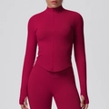 Close-up of cranberry red yoga jacket with stand collar, full zipper and thumbhole cuffs - S / Burgundy