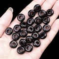 Hand holding polished black stone abacus beads with large holes for DIY jewelry - 6x12mm Obsidian (Single)