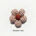 Close-up of a 5.5cm brown houndstooth fabric flower accessory with padded 3D texture - Off-white Houndstooth
