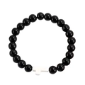 Macro detail of black beaded bracelet with a white cross pendant on a white background - Glossy Black Cross