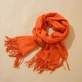 Vibrant orange faux cashmere scarf featuring long tassels and soft warm texture - Orange Yellow