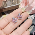 Detail of crown earrings with pink pear-cut gemstones and sparkling white zircons - 0332 Pink White Pear Crown Studs