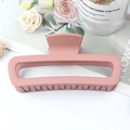 Elegant matte pink hollow square claw clip for hair styling in a minimalist design - Rubber Pink