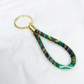 Bohemian multicolored woven wrist strap keychain with gold-tone lobster clasp - Red Green Black Yellow