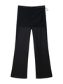 Detalle de pantalones negros satinados para mujer con delantal de encaje y lazo en cintura - XS / Negro