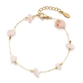 Detail view of gold stainless steel chain bracelet with seven raw pink quartz stones - Pink