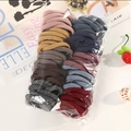 Pack of seamless elastic hair ties in multi-colored pastel tones for women - 50 Pcs Bag / Deep Multicolor