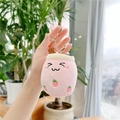 Close-up of pink plush milk tea pendant with cute strawberry embroidery and metal keychain - Squinting Eyes/Normal Chain / Pink