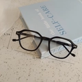 Detail view of black polygon kids glasses showing 4.3cm height and 12.5cm width dimensions - Black