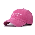 Close-up of rose red washed cotton cap featuring white Champagne please embroidery - Adjustable / Washed Rose Red