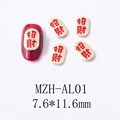 Macro shot of Lucky charm nail art alloy accessory with red oil drip and gold base - Attract Wealth Style (AL01)