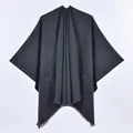 Classic black hooded poncho with functional pockets and fringe hem detailing - Single Color with Pocket and Frayed Edge / Black