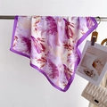 Detail of floral purple silk scarf hanging on a metal rack showing fabric texture - 66-70cm / Purple (FJ967-5)