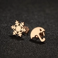 Rose gold asymmetrical snowflake and umbrella stud earrings on a dark textured surface - 677 Rose Gold (Snowflake & Umbrella)