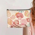 Détail de la trousse à maquillage en toile avec coquillages colorés et fermeture éclair - Style Coquillage Rose (jiaying0080)