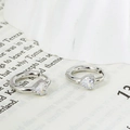 Orecchini a cerchio in acciaio al titanio argento con zircone a forma di cuore - Argento-Zircone Bianco