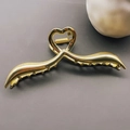 76# Pinza de pelo cruzada de corazón dorada / Grande