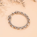 Détail d'un bracelet double couche argenté avec chaînes à billes et maille forçat - Couleur Acier (KB144917-Z)