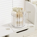 Rotating acrylic desk organizer in clear finish holding stationery pens on a wooden table - Rotating Pen Holder / White