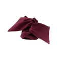Detailed texture of burgundy velvet fabric wire headband with elegant twisted knot - Red