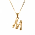 Detailed close-up of a gold bamboo-textured letter M pendant on a delicate chain - Letter M