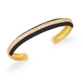 Dettaglio del bracciale rigido dorato con smalto nero e pietre di zircone brillanti - Nero