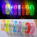 Glow-in-the-dark LED bracelets in eight colors showing light-up effect and battery box - Multicolor Mix