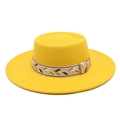 Close-up of a yellow wool felt boater hat with a bohemian geometric patterned hatband - M (56-58cm) / Yellow