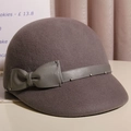 Close-up of wool felt equestrian hat featuring faux leather bow strap and silver studs - M (56-58cm) Adjustable / Gray