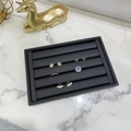 Black velvet jewelry display tray with multiple slots for rings and earrings - Small Black PU Leather Flat Slot Tray - No Lid