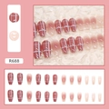 Detail view of R688 press-on nails featuring red plaid patterns and heart gradient designs - R688 Plaid Heart
