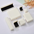 Premium cream jewelry box set with gold trim edges and black velvet lining for rings and necklaces - White