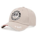 Detail of khaki tactical baseball cap featuring SWAT eagle embroidery and durable fabric - One Size / Khaki