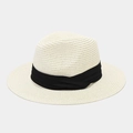 Close-up of cream Panama straw hat featuring a wide black fabric ribbon around the crown - Ivory