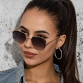 Detail of square gold metal sunglasses with gradient lenses worn by a model - C03 Gradient Grey