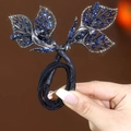 Pince à cheveux élégante avec zircons bleus et design de feuilles avec élastique - Style Feuille Bleue
