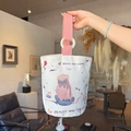Off-white canvas bucket bag with pink girl and cat illustration and pink strap handles - Princess and Cat