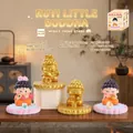 Resin Capybara Buddha figurine phone stand on a decorative lotus base with gold finish - Set of Four Buddha Ornaments (1081-17)