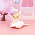 Close-up of resin ballet girl figurine in white feather dress and purple hair on car dash - 10A Purple Hair Praying Style (10A)