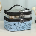 Double-layer travel makeup bag with clear top and blue geometric quilted bottom - Blue