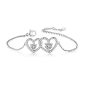 Élégant bracelet avec deux cœurs entrelacés serti de zircons brillants en argent - Cœurs Entrelacés / Platine/Zirconium Blanc