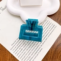 Square teal marble acetate hair claw clip on a white decorative tray for styling - Dark Blue Green