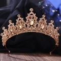 Close-up of golden bridal tiara featuring shimmering pear-cut crystals and leaf motifs - KC Gold Smoky Yellow Diamond