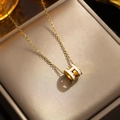 Elegant gold titanium necklace with a white enamel H-shaped pendant for women - 8803 Gold White