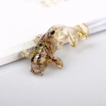 Fish figurine ornament crafted with natural crystals and gold leaf in clear resin - Tourmaline