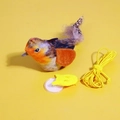 Interactive bird cat toy with orange head, feathers, elastic string and suction cup - Hanging Orange Bird Toy